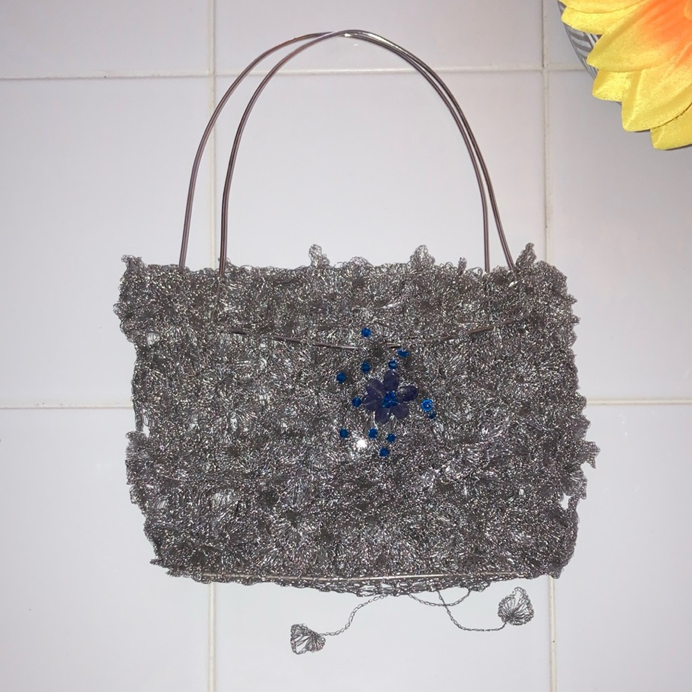 Elegant Silver Handbag with Blue Accents
